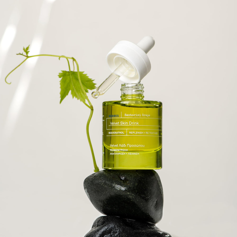 KORRES serum styled on bathroom shelf conveying everyday routine use