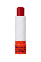 KORRES Wild Rose ingredient oils flatlay showing botanical blend for soft lips