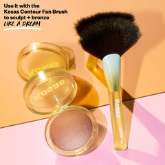 Kosas bronzer being applied with brush delivering seamless blend benefit