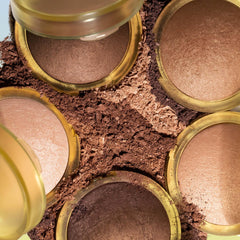 Kosas bronzer in a beach setting suggesting sun-kissed, everyday glow