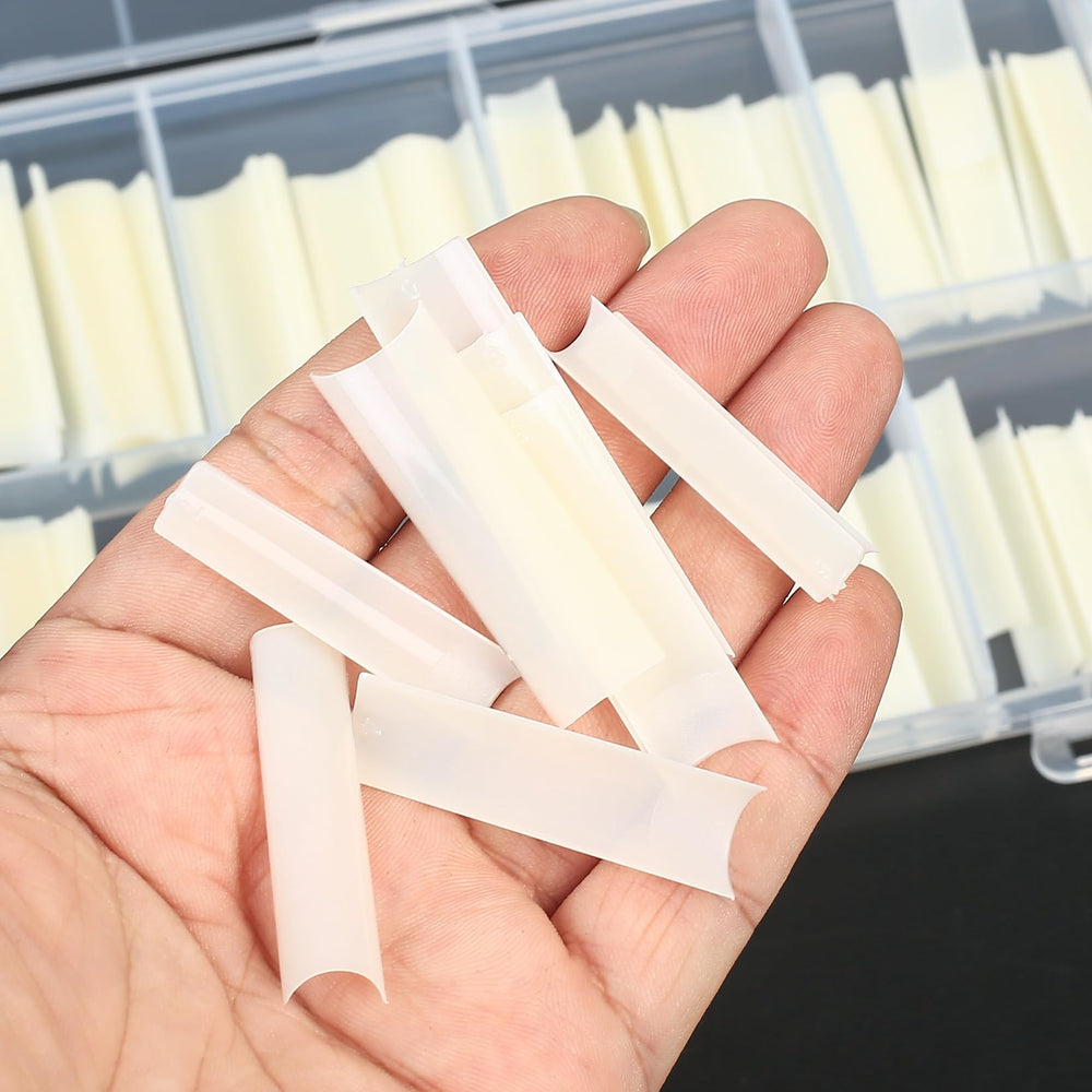 KOXXIAMOQ application in salon with technician pressing tip for secure adhesion