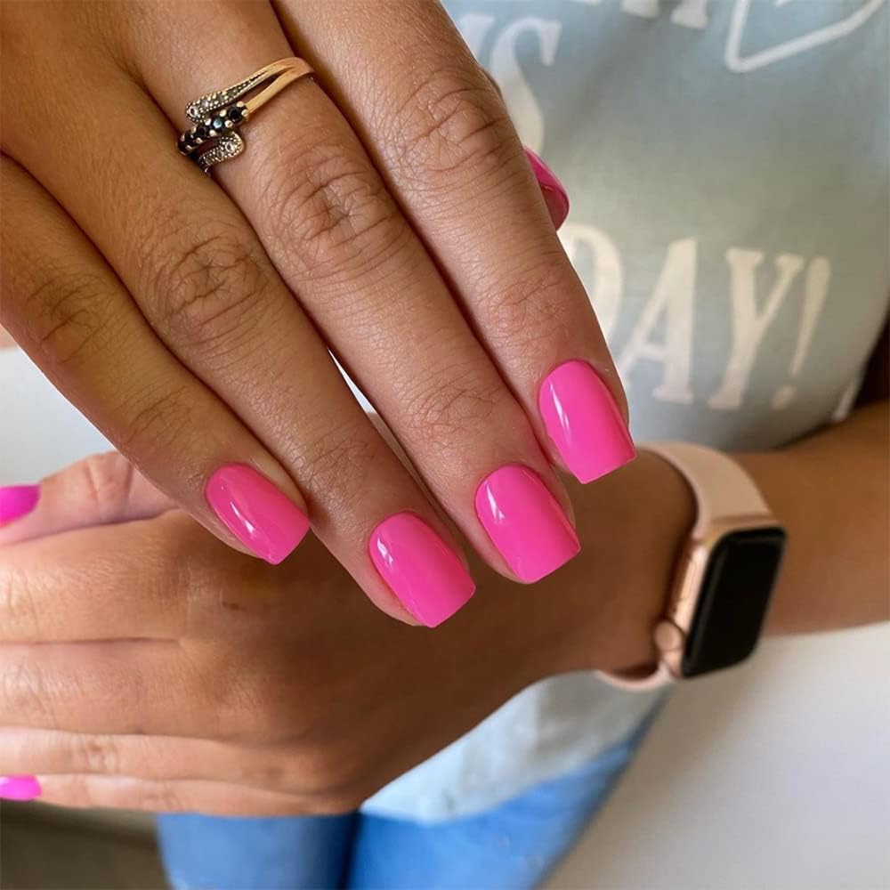KQueenest press-on nails in hand during application illustrating easy at-home use