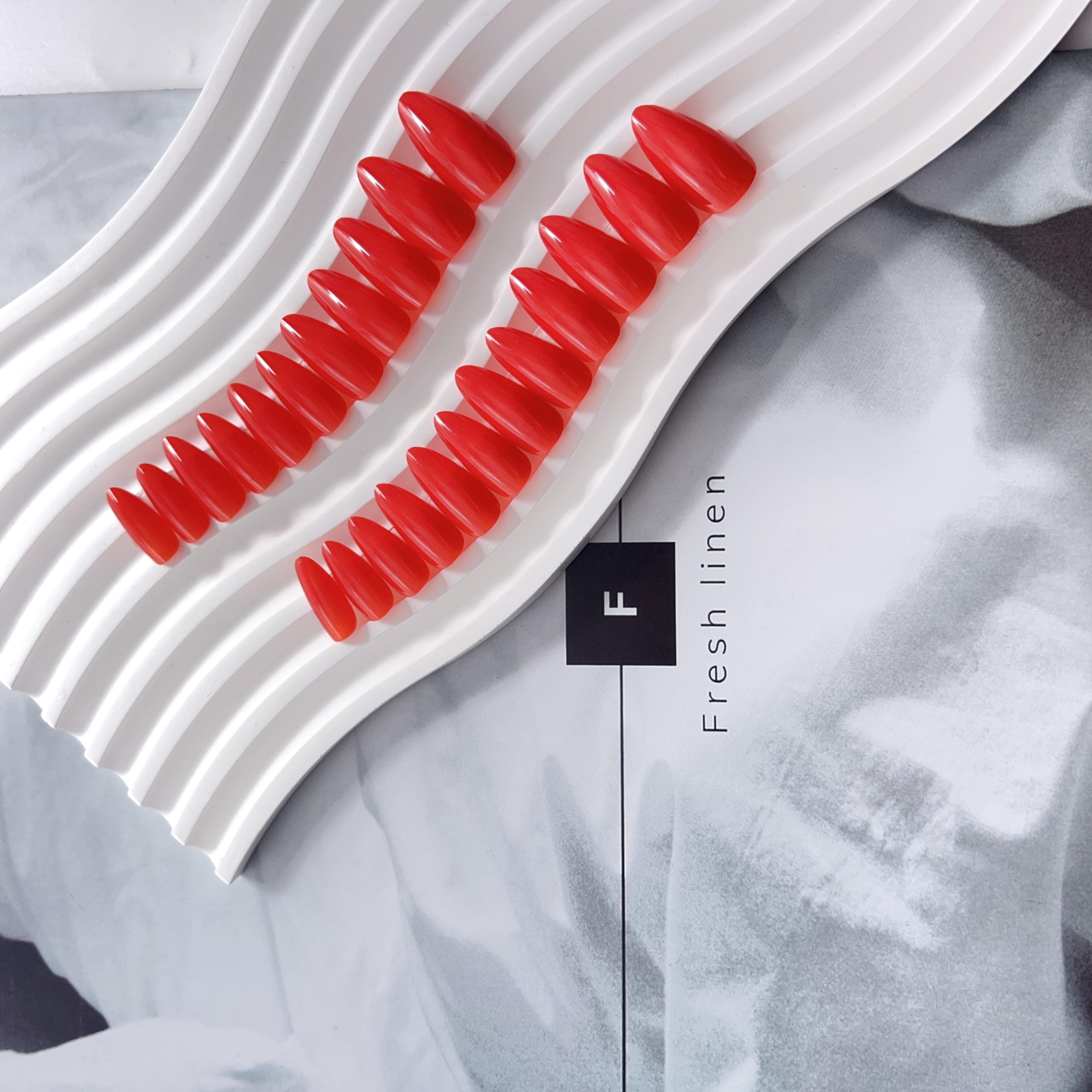 KQueenest press-on nail being applied demonstrating easy five-minute application benefit