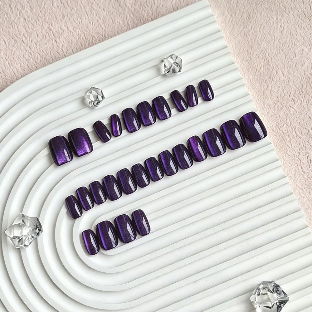 KQueenest application kit with adhesive tabs, mini file, and cuticle stick included