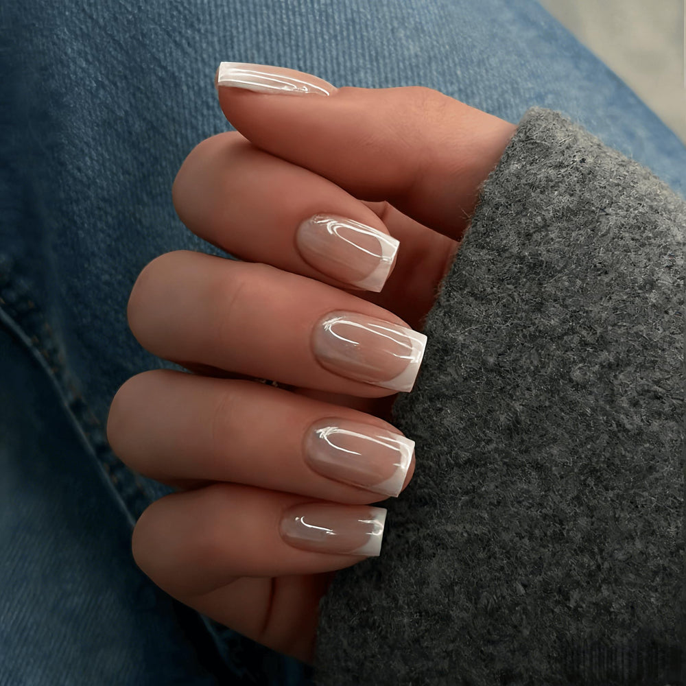 KQueenest close-up of chrome white French tip showcasing mirror-like shine and glam
