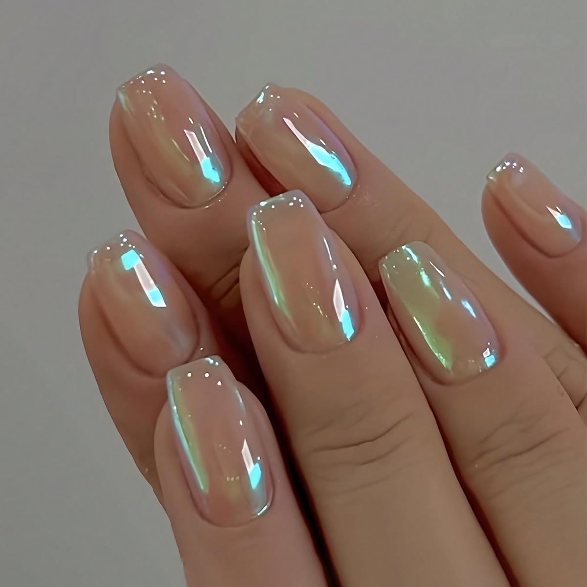 KQueenest front packaging of champagne chrome coffin nails highlighting ready-to-wear glamour