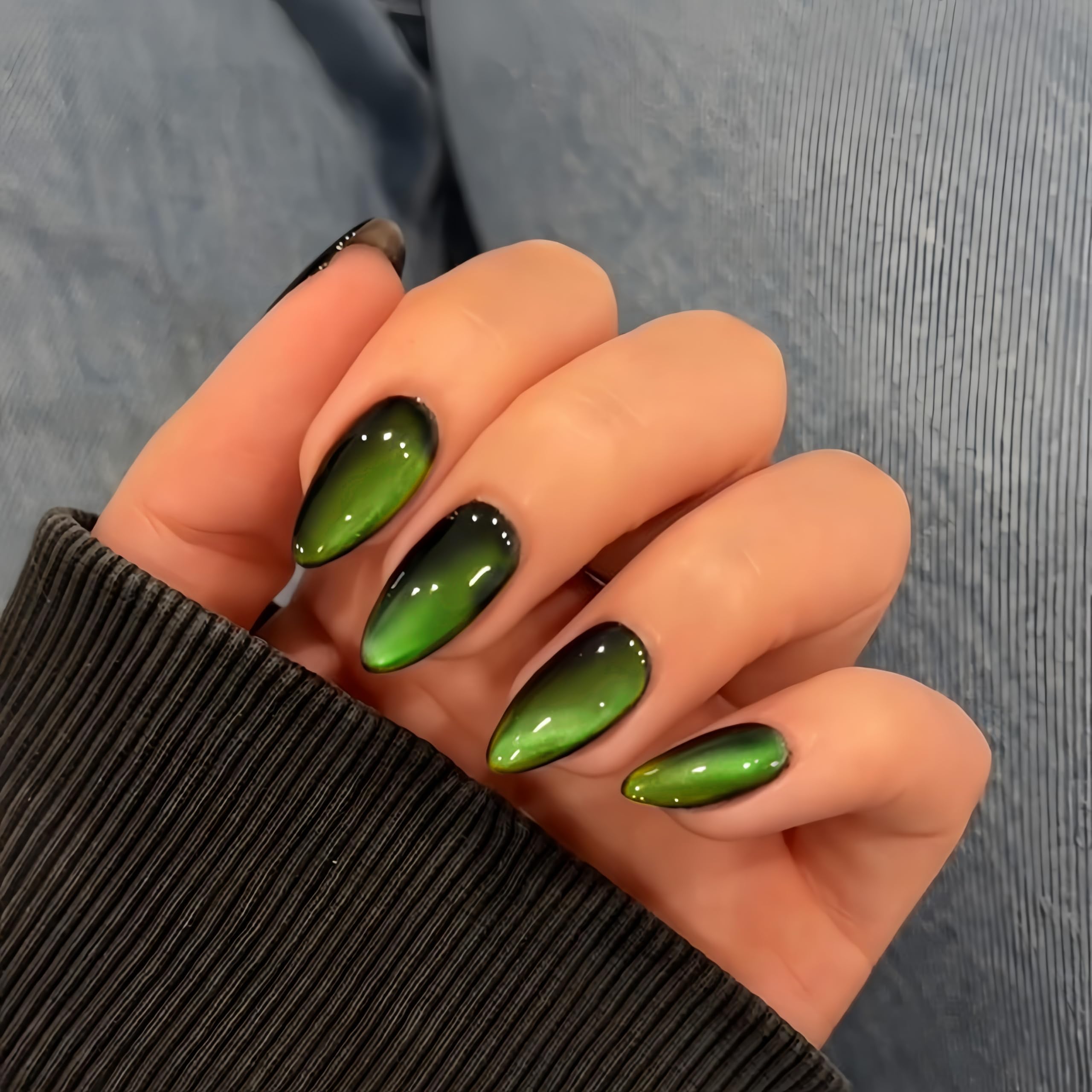 KQueenest front packaging showing neon green cat-eye nails and bold finish
