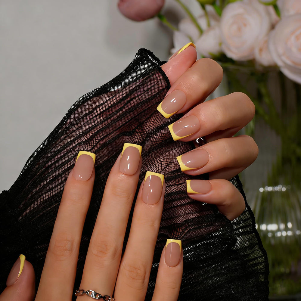 KQueenest front packaging showing yellow French tip set and included tools