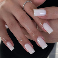 KQueenest front set view showing glossy white coffin nails and neat finish