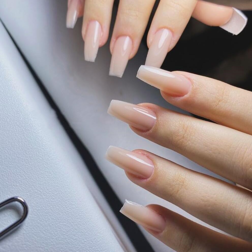 KQueenest hand application demonstrating quick press-on convenience and secure fit