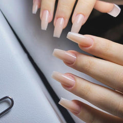 KQueenest hand application demonstrating quick press-on convenience and secure fit