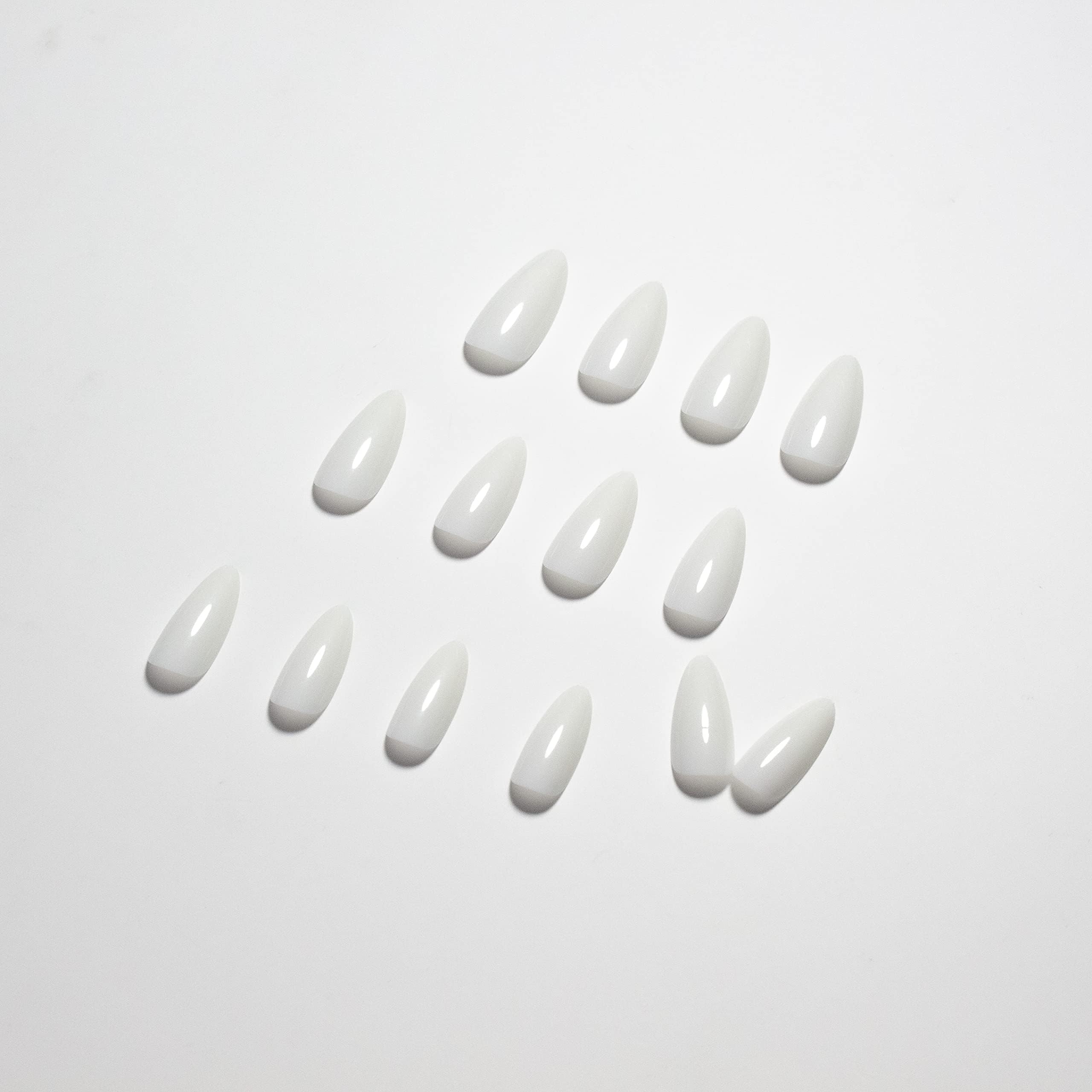 KQueenest worn at a wedding showcasing elegant white nails for special occasions