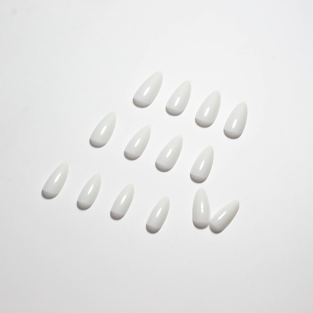 KQueenest worn at a wedding showcasing elegant white nails for special occasions