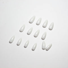 KQueenest worn at a wedding showcasing elegant white nails for special occasions
