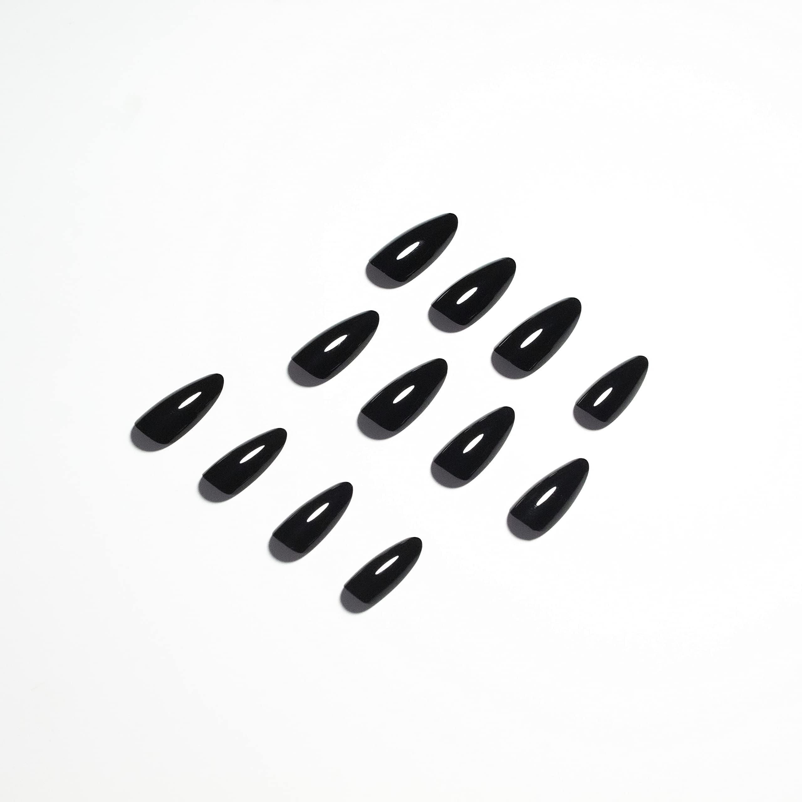 KQueenest nails on hand during application showing quick five-minute manicure benefit