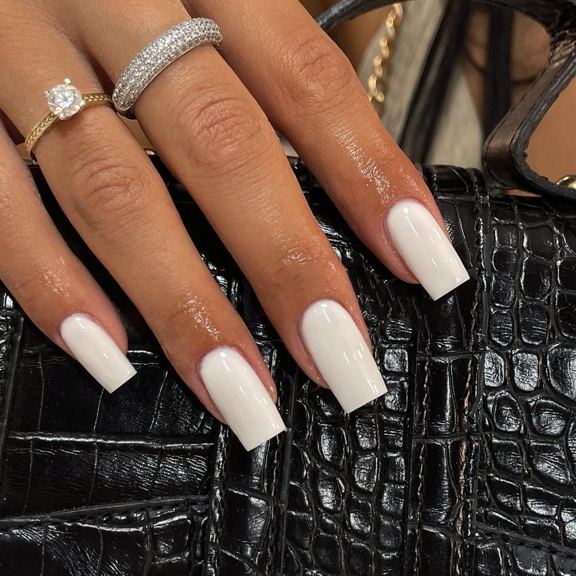 KQueenest nails worn on hand lifestyle shot showing polished everyday look
