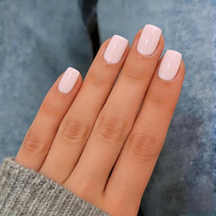 KQueenest close-up of glossy pastel pink surface highlighting durable salon shine