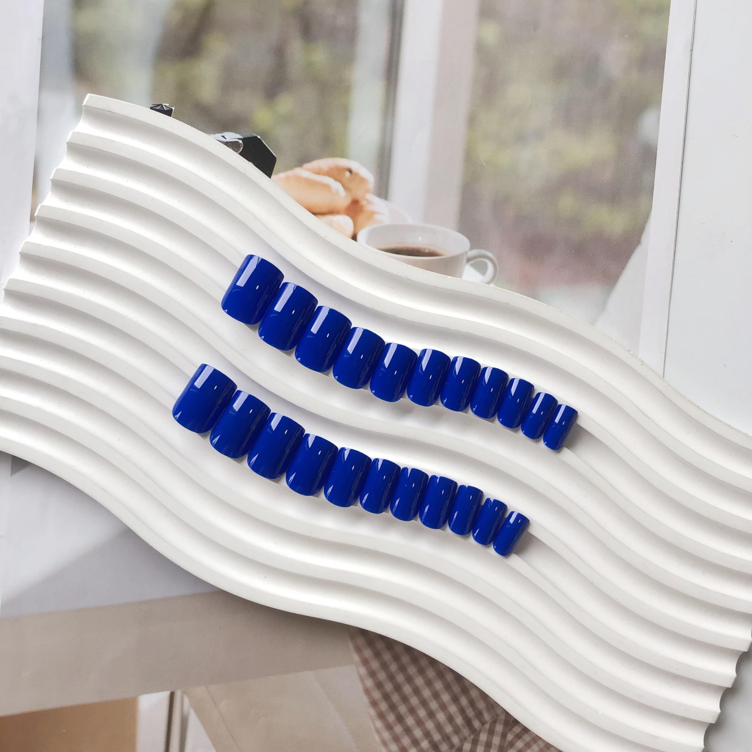 KQueenest side profile showing nail thickness and durable acrylic-like strength
