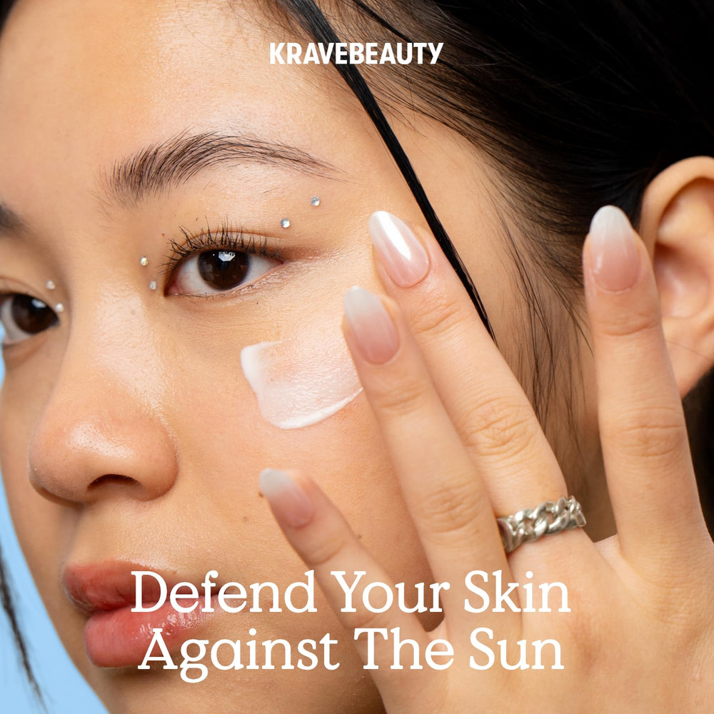 kravebeauty applying sunscreen on hand for quick absorption benefit