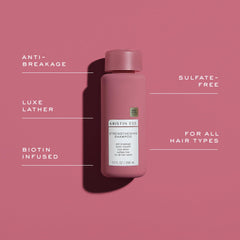 Kristin Ess shampoo bottle staged in bathroom for lifestyle appeal