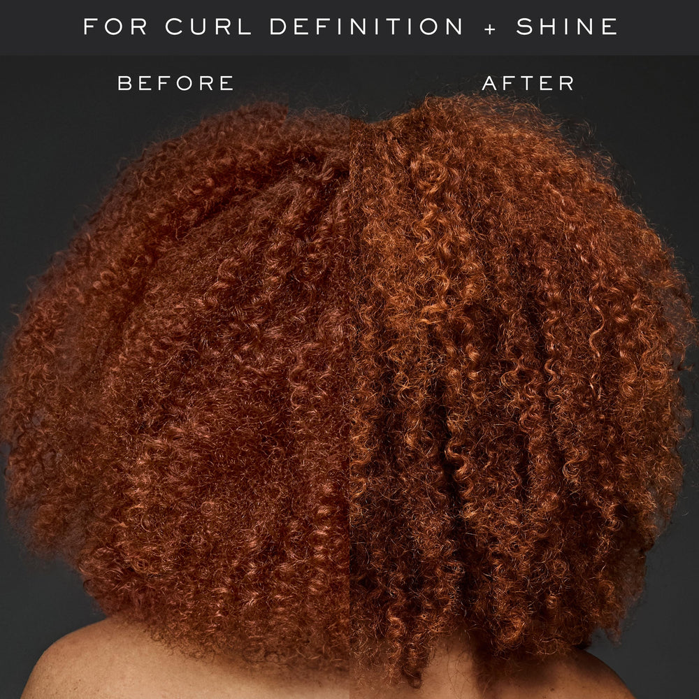 Kristin Ess cream applied to hair mid-lengths improving definition