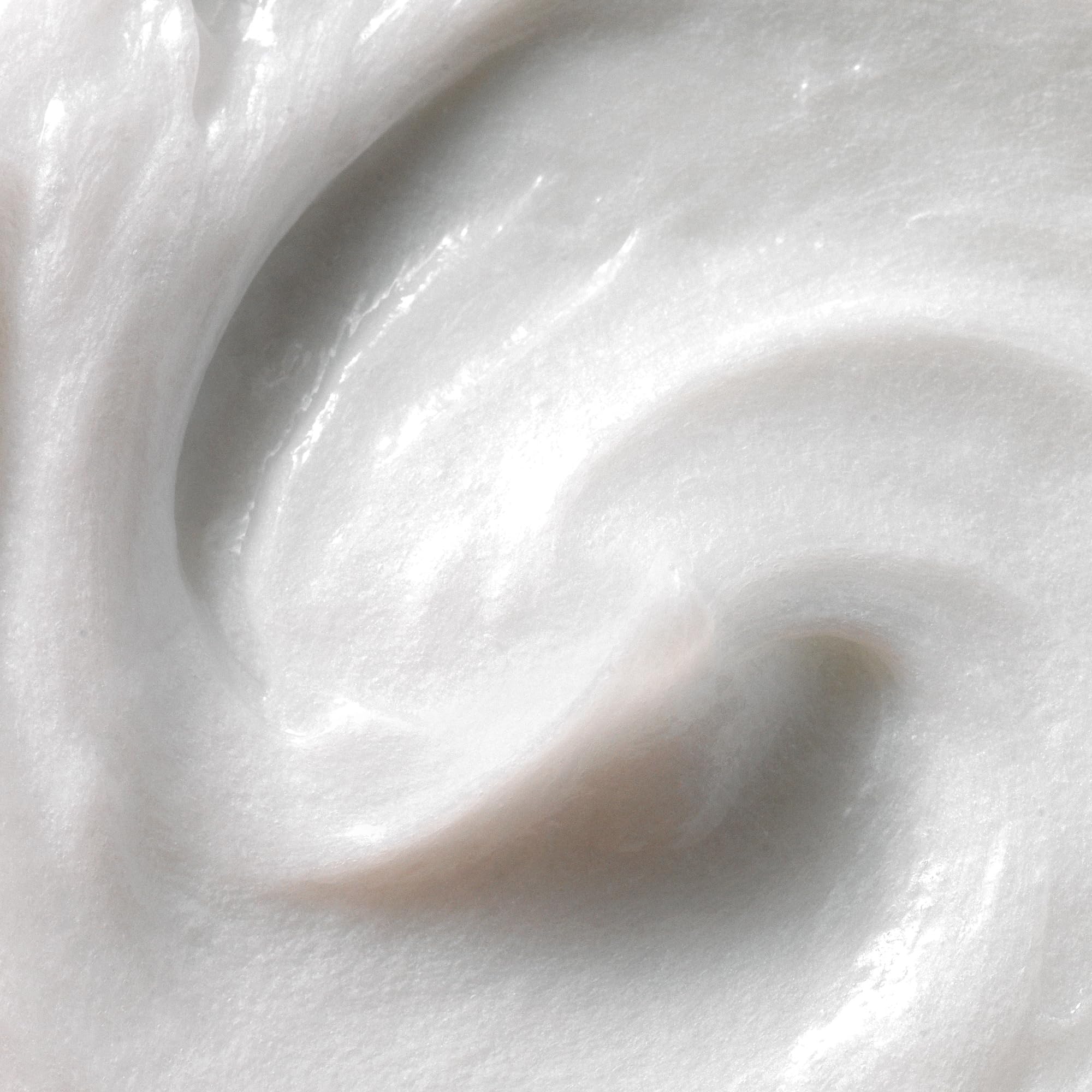 Kristin Ess shampoo lather texture illustrating gentle cleansing
