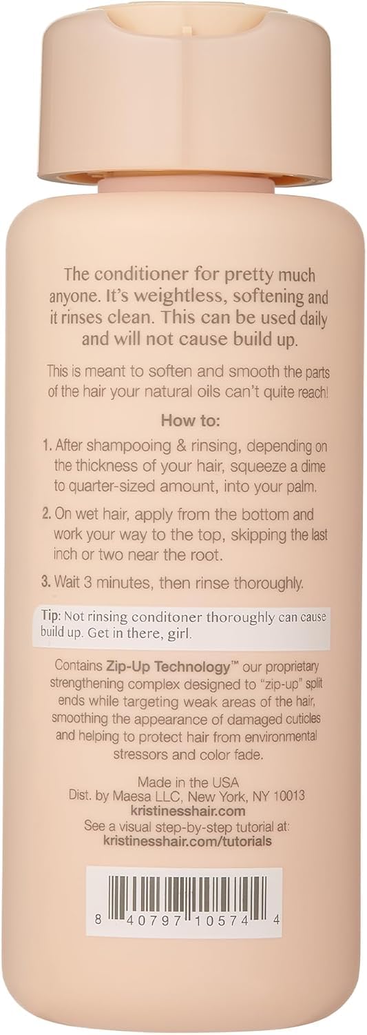 Kristin Ess conditioner texture closeup highlighting smooth creaminess