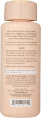 Kristin Ess conditioner texture closeup highlighting smooth creaminess