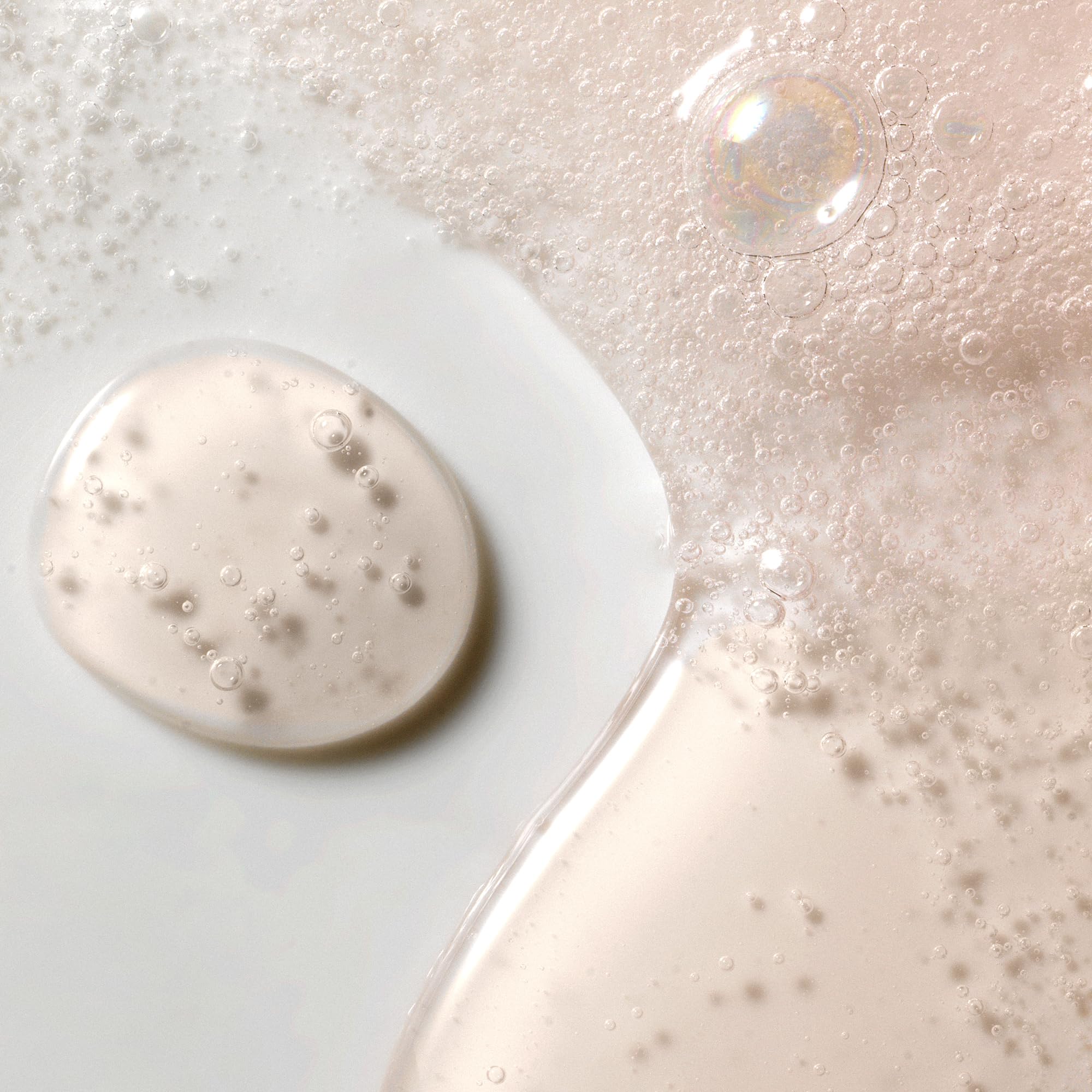 Kristin Ess ingredient detail highlighting Zip-Up Technology for stronger hair