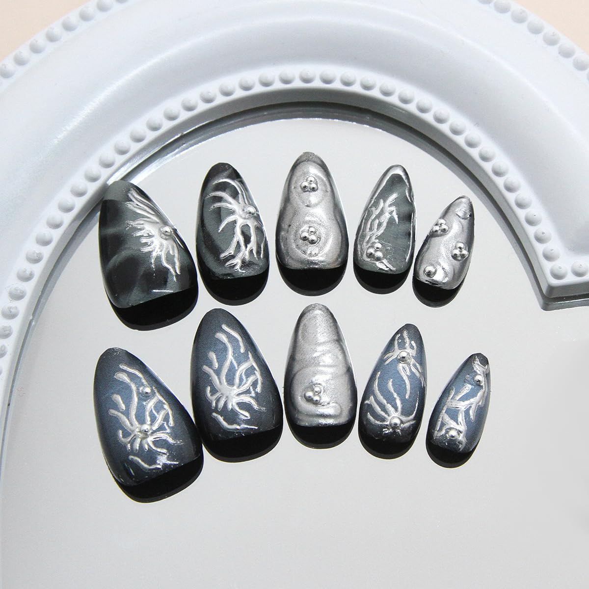 KRTBKR side profile of almond-shaped nail illustrating curve and comfortable wear fit