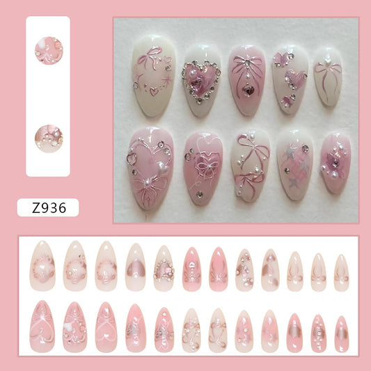 KRTBKR close-up of 3D heart and pearl accents, highlights intricate decorative detail