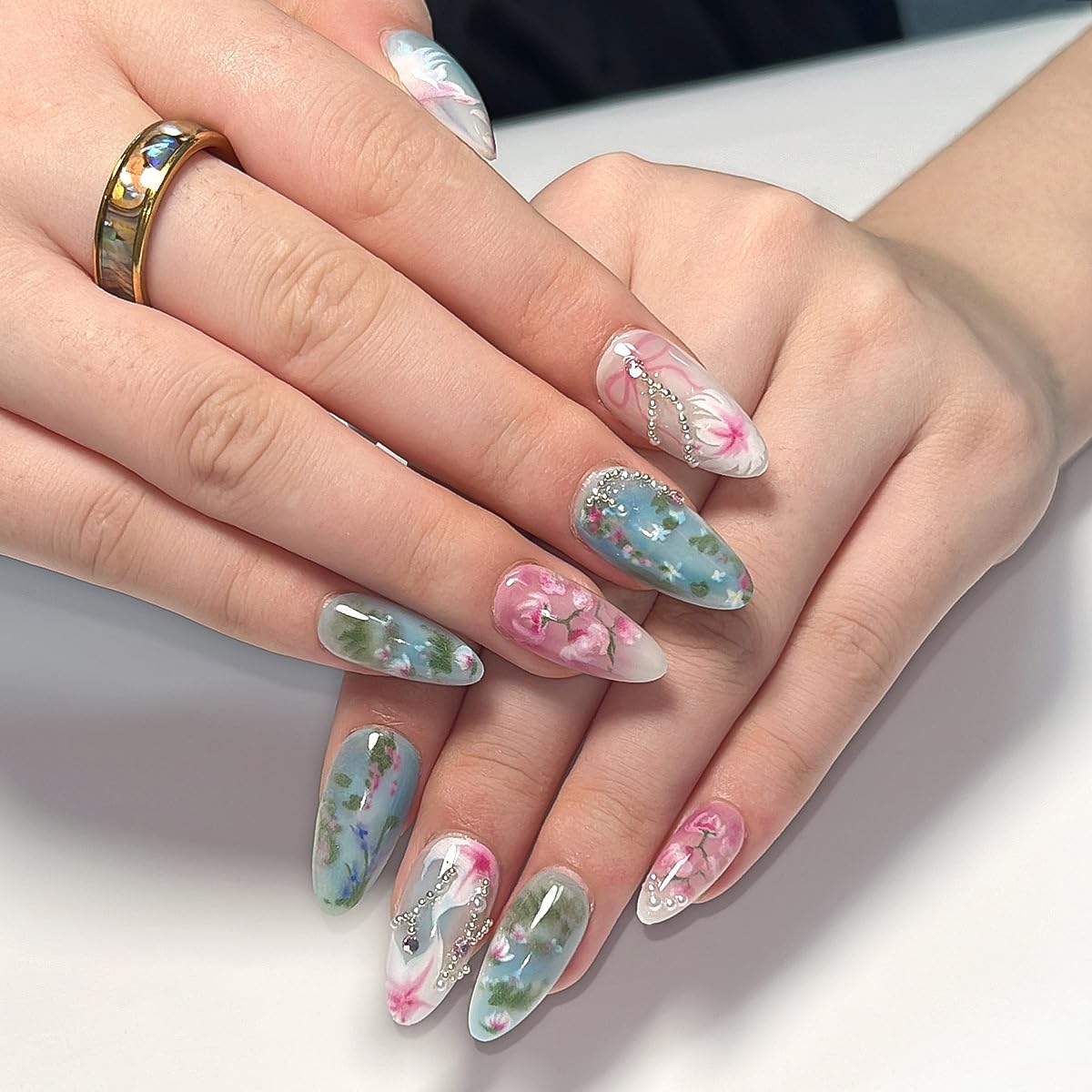 KRTBKR close-up of green pink floral and cat artwork for eye-catching detail