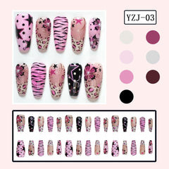 KRTBKR close-up zebra stripes and French tip detail offering bold Y2K style