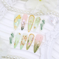 KRTBKR side profile of long stiletto nail highlighting glossy finish and strength