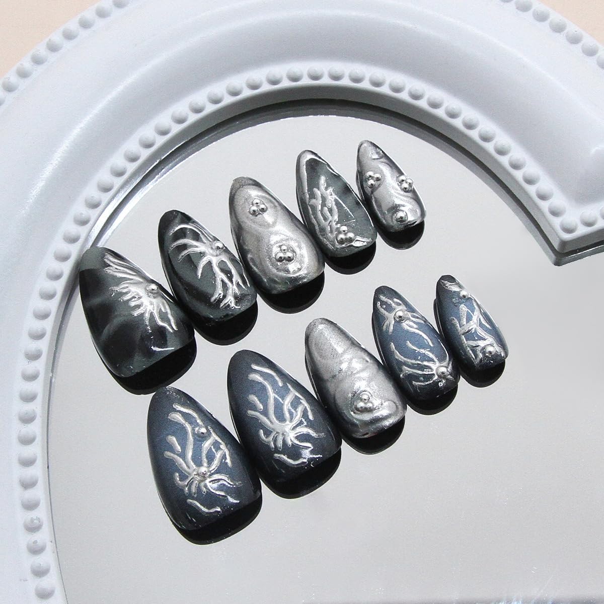 KRTBKR nails applied on hand full cover showing instant dramatic look for events