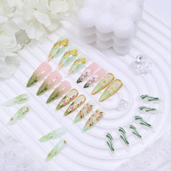 KRTBKR hand model wearing nails to show scale and elegant length for events