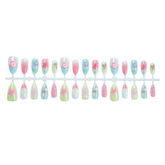 KRTBKR nails worn on hands in a beach setting showcasing seasonal style and photogenic look