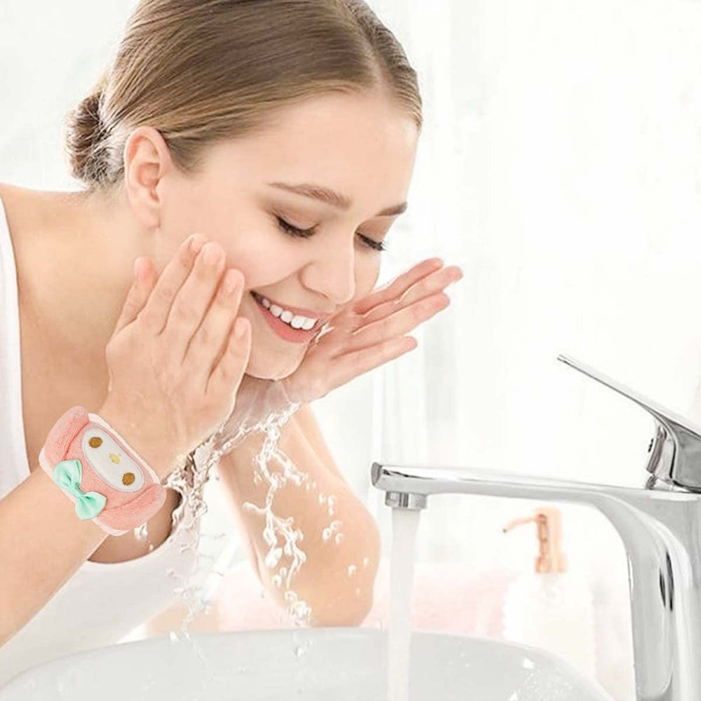 Kugiter headband in use in bathroom keeping hair back during face wash