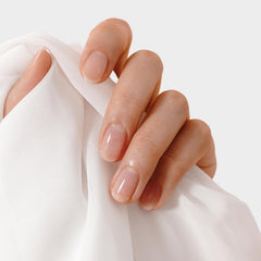 KUPA GelFinity in-salon application showing tech curing for faster services