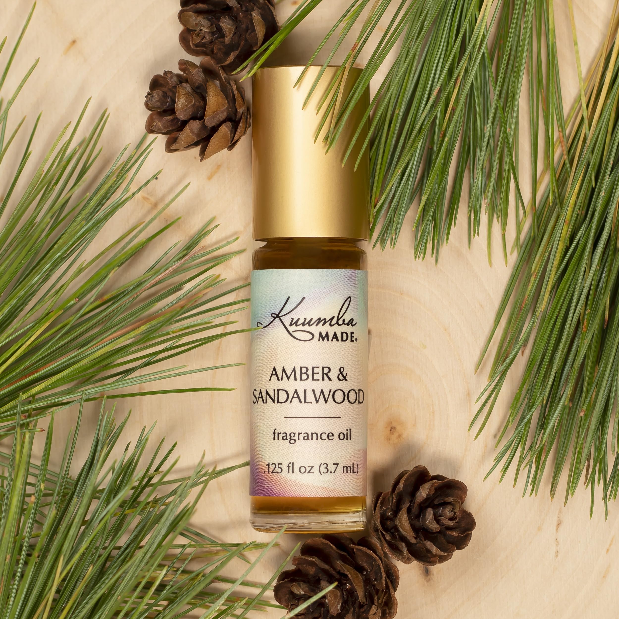 Kuumba Made close-up of rollerball and oil texture for smooth, precise application benefit