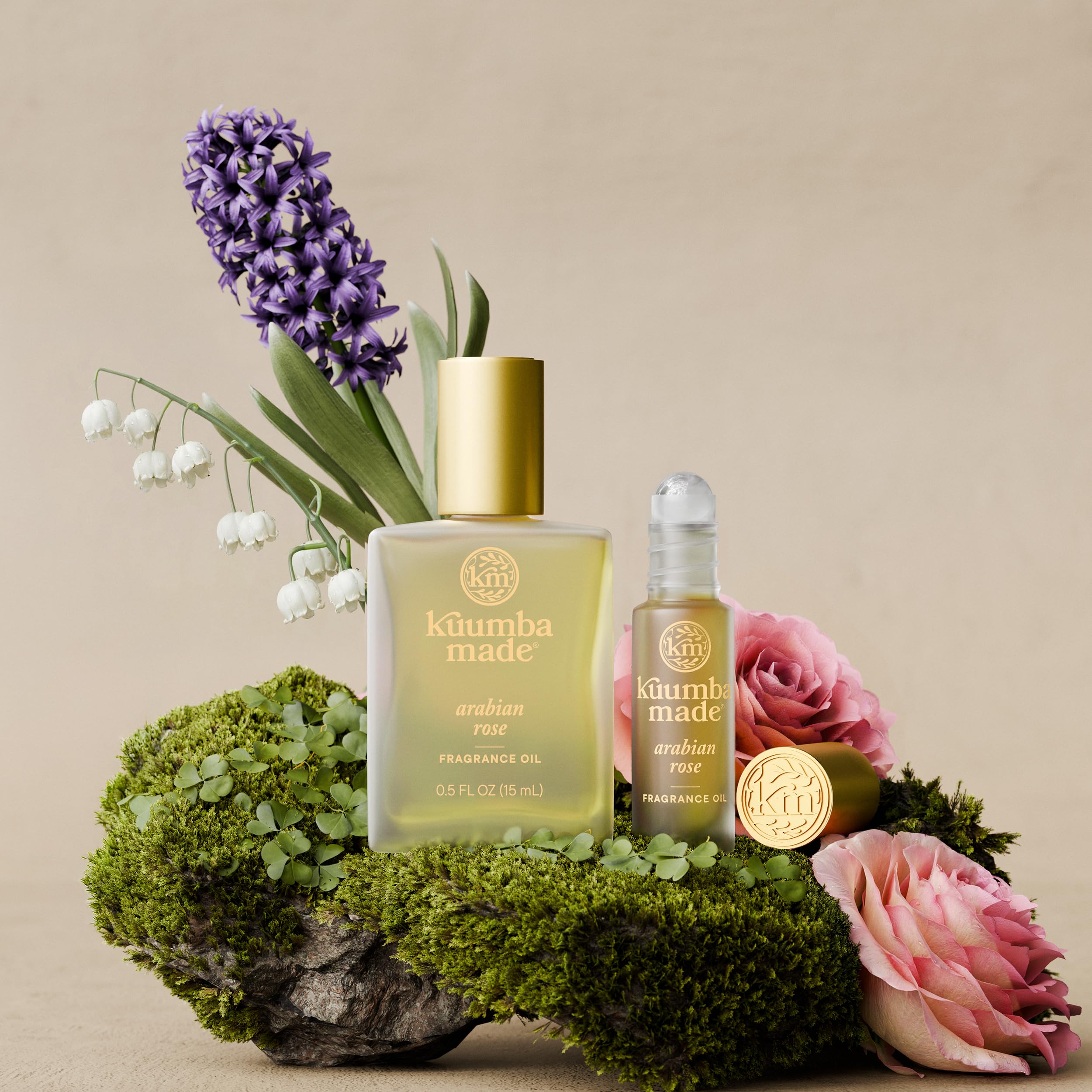 Kuumba Made lifestyle flatlay with rose accents suggesting gift-ready, everyday luxury