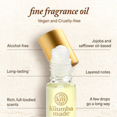 Kuumba Made roll-on applied to wrist illustrating easy touch-up and subtle fragrance wear