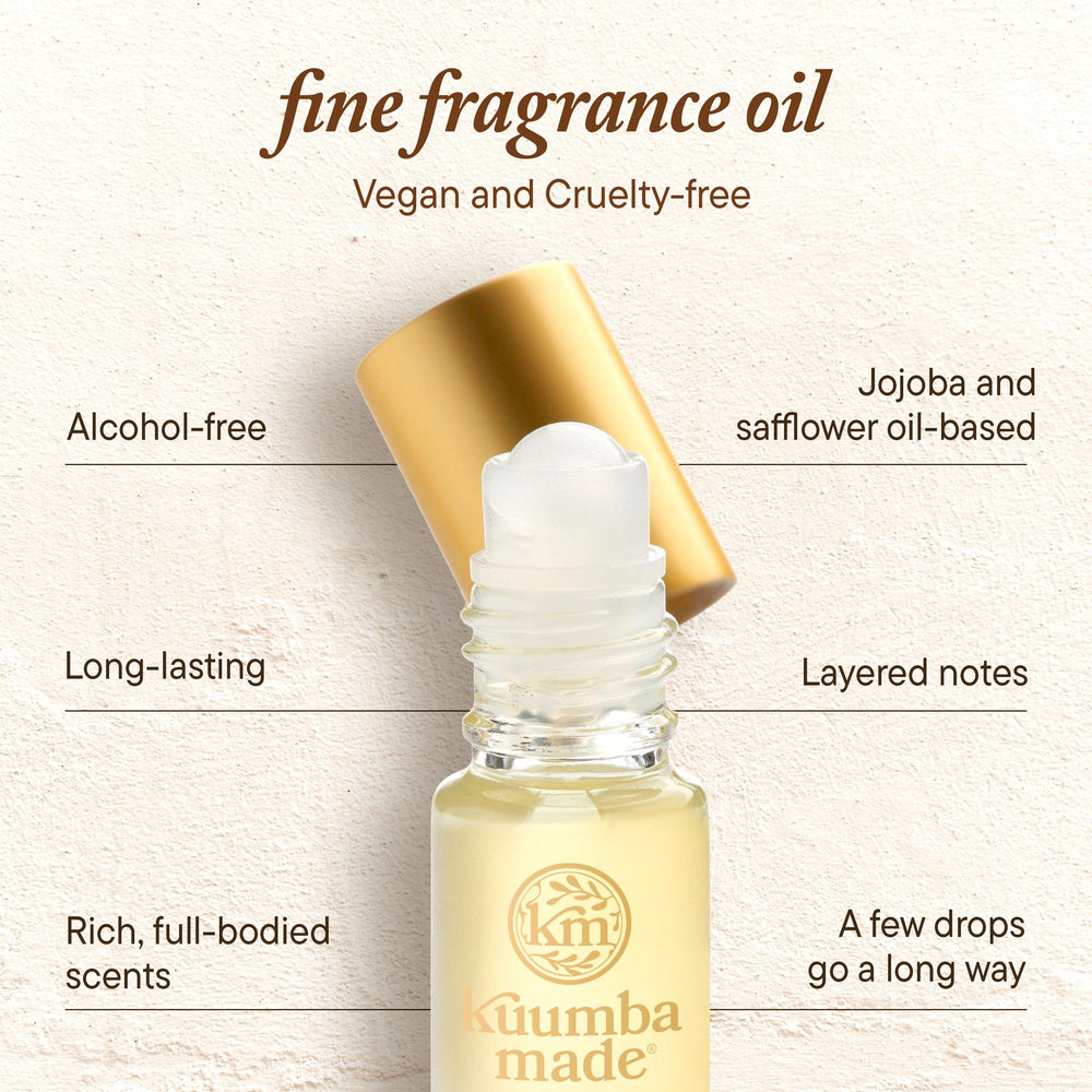 Kuumba Made roller held in hand to show scale, benefit: pocket-friendly 0.15 fl oz size