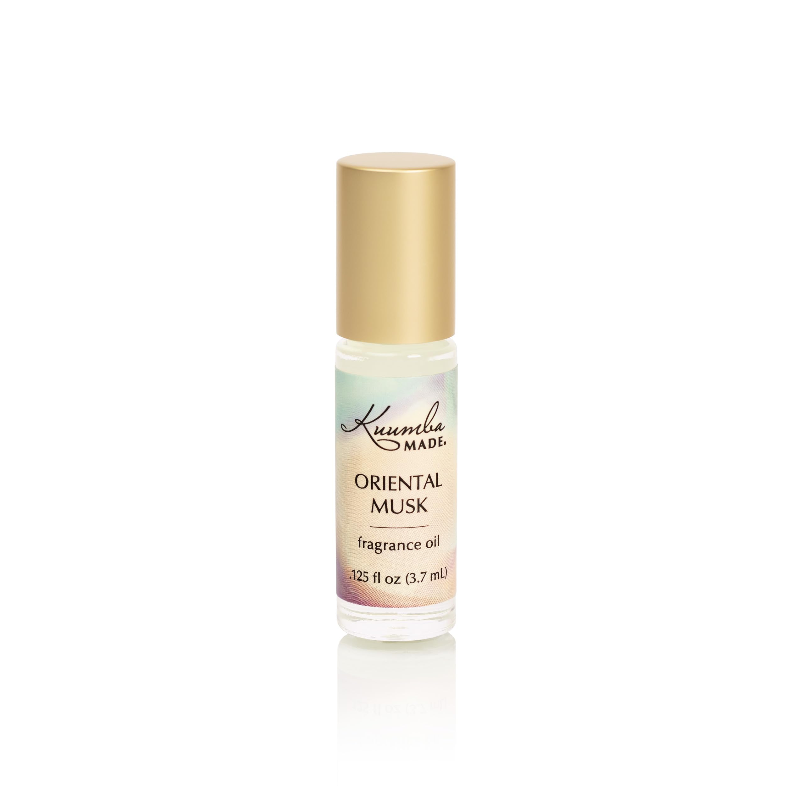 Kuumba Made front bottle shot showing label and compact roller, travel-friendly scent