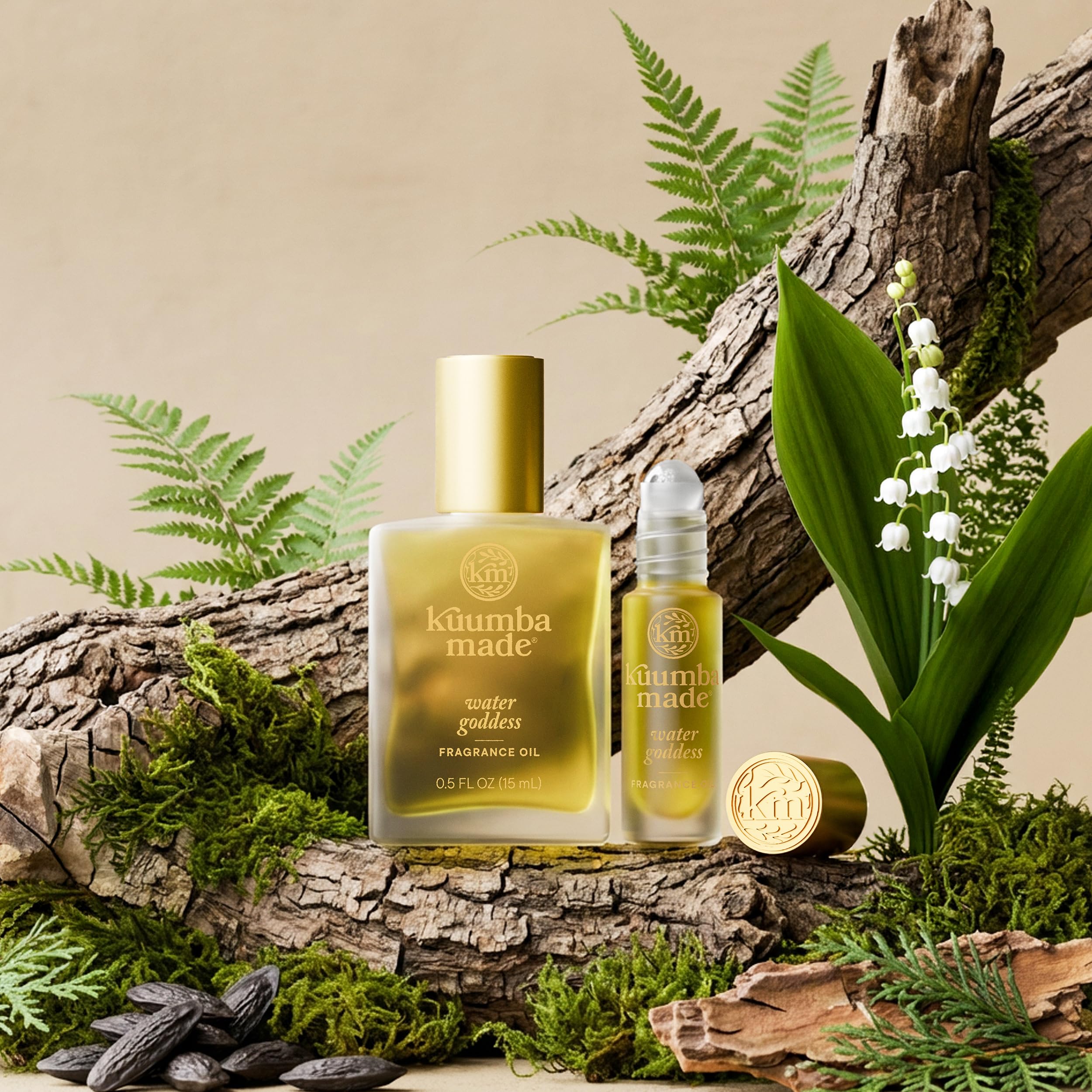 Kuumba Made roll-on inside handbag highlighting compact travel-ready scent solution