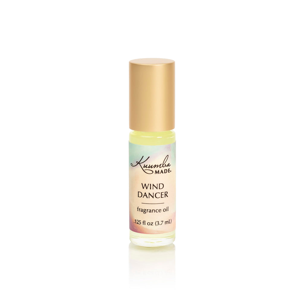 Kuumba Made Wind Dancer front bottle shot showing compact roller and label benefits
