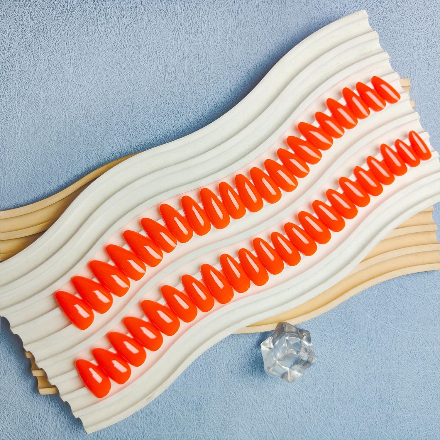 KXAMELIE application image with adhesive tabs shown for quick no-glue wear
