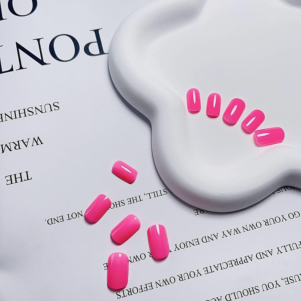 KXAMELIE nails applied with adhesive tabs for fast, tool-free attachment