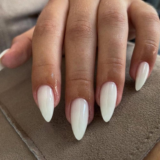 KXAMELIE front packaging showing frosted white almond nails, clear salon finish