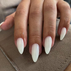 KXAMELIE front packaging showing frosted white almond nails, clear salon finish